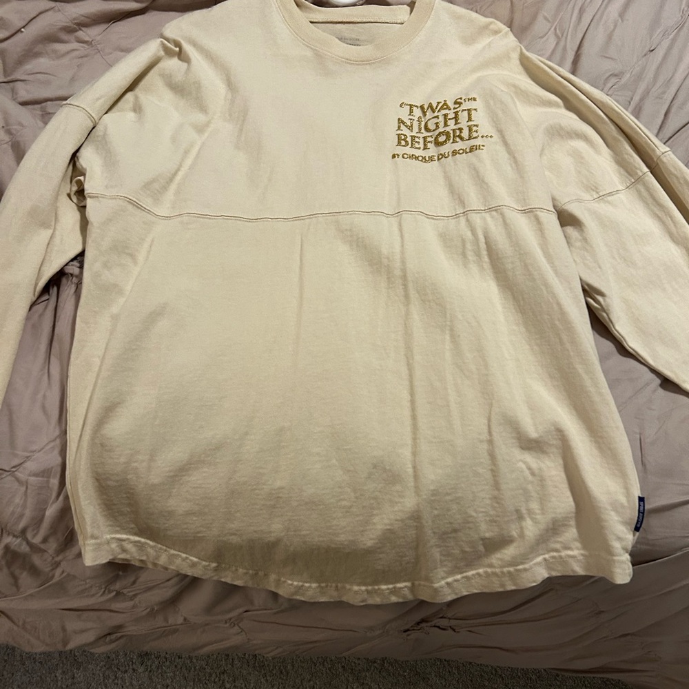 Beige Long Sleeve Shirt with Gold Text